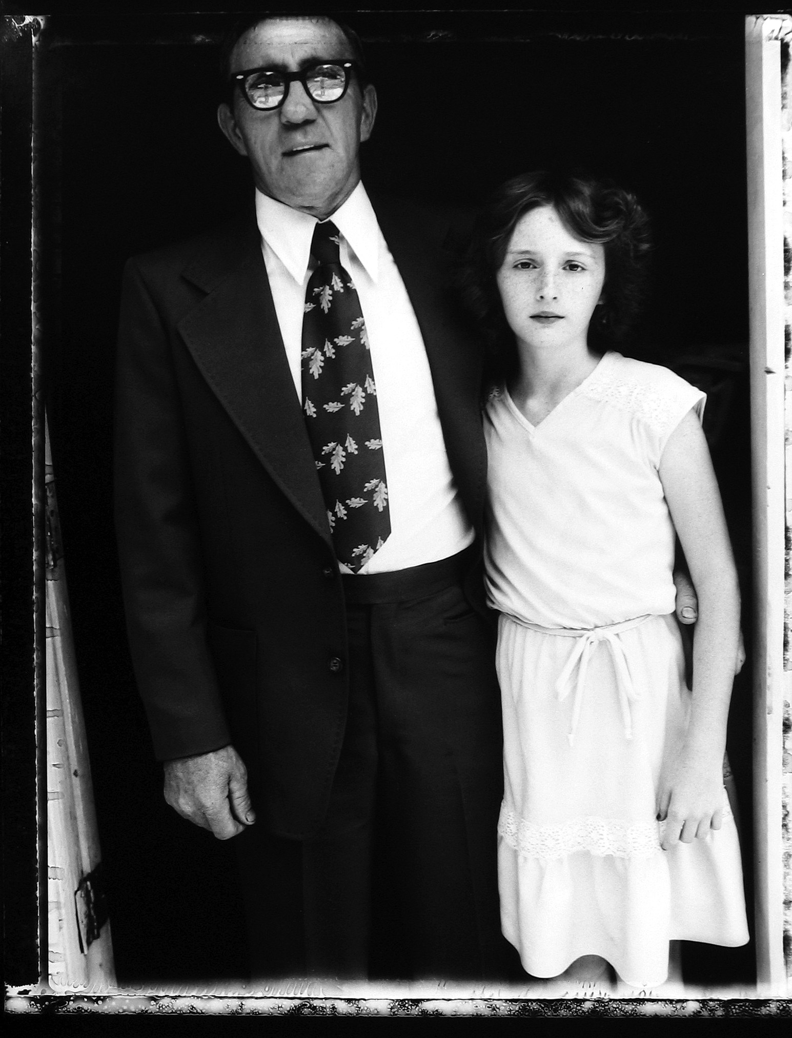 Bill Burke - Reverend Robert Elkins and niece, Church of Jesus Name, Jolo, West Virginia, 1979 - Howard Greenberg Gallery