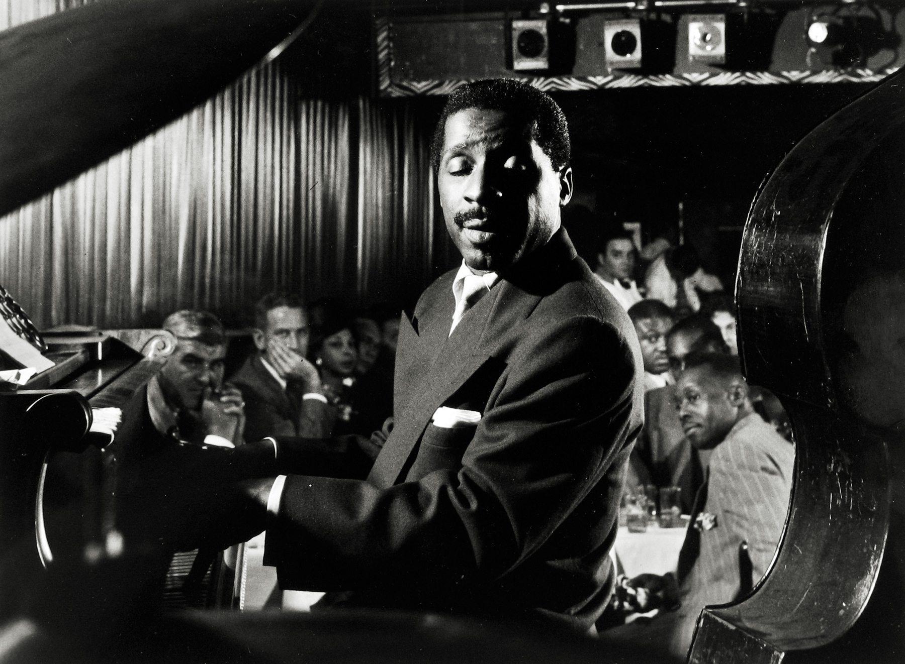 Dennis Stock - Erroll Garner, American Jazz Pianist at the "Three Duces", NY, 1958 - Howard Greenberg Gallery