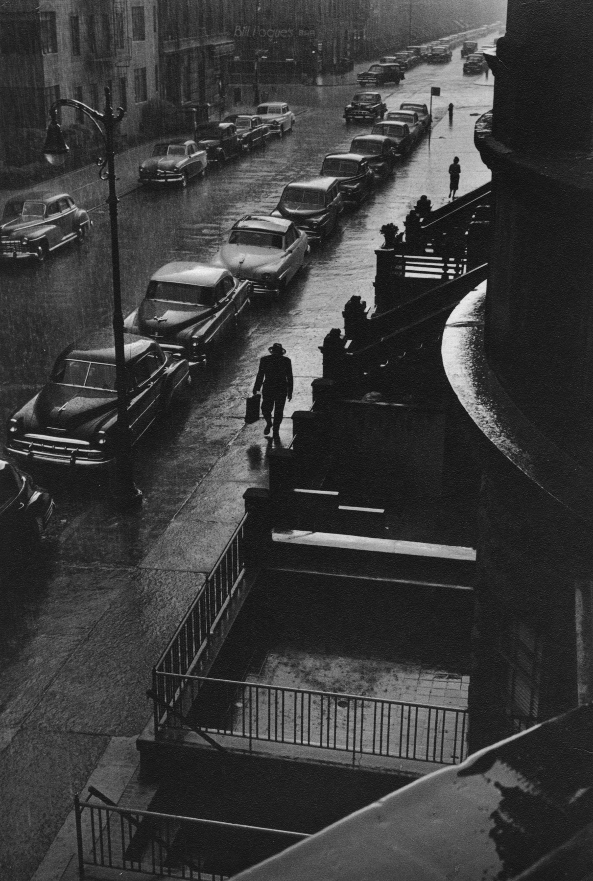 Ruth Orkin - Man in Rain, 1952 - Howard Greenberg Gallery