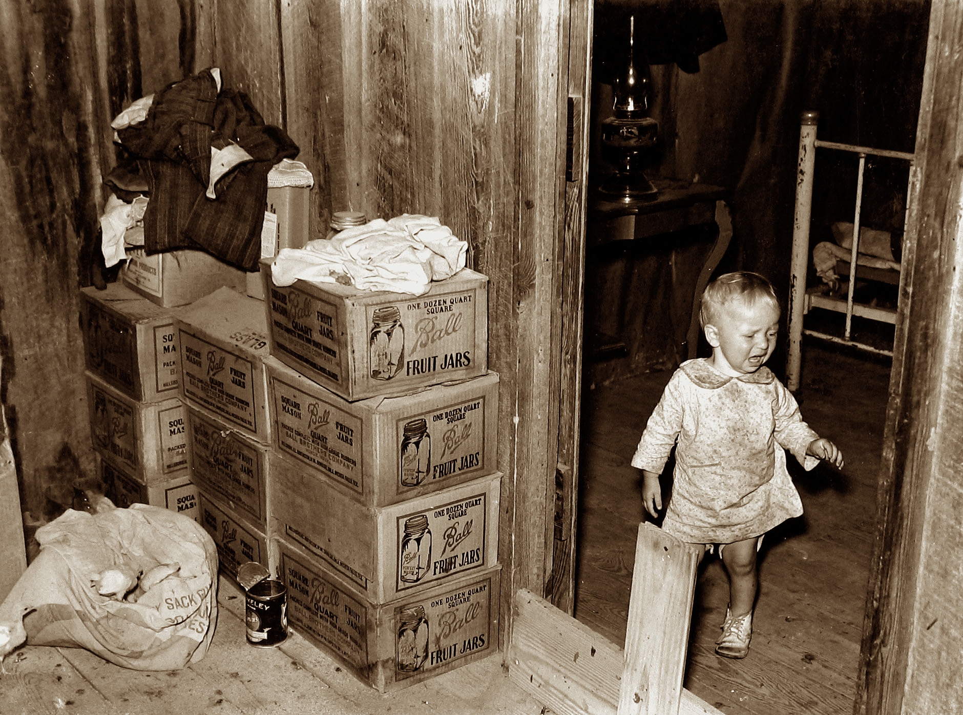 Russell Lee - Combination storage room and chick room, adjacent to bedroom in sharecropper's house, c.1936-37 - Howard Greenberg Gallery - 2019