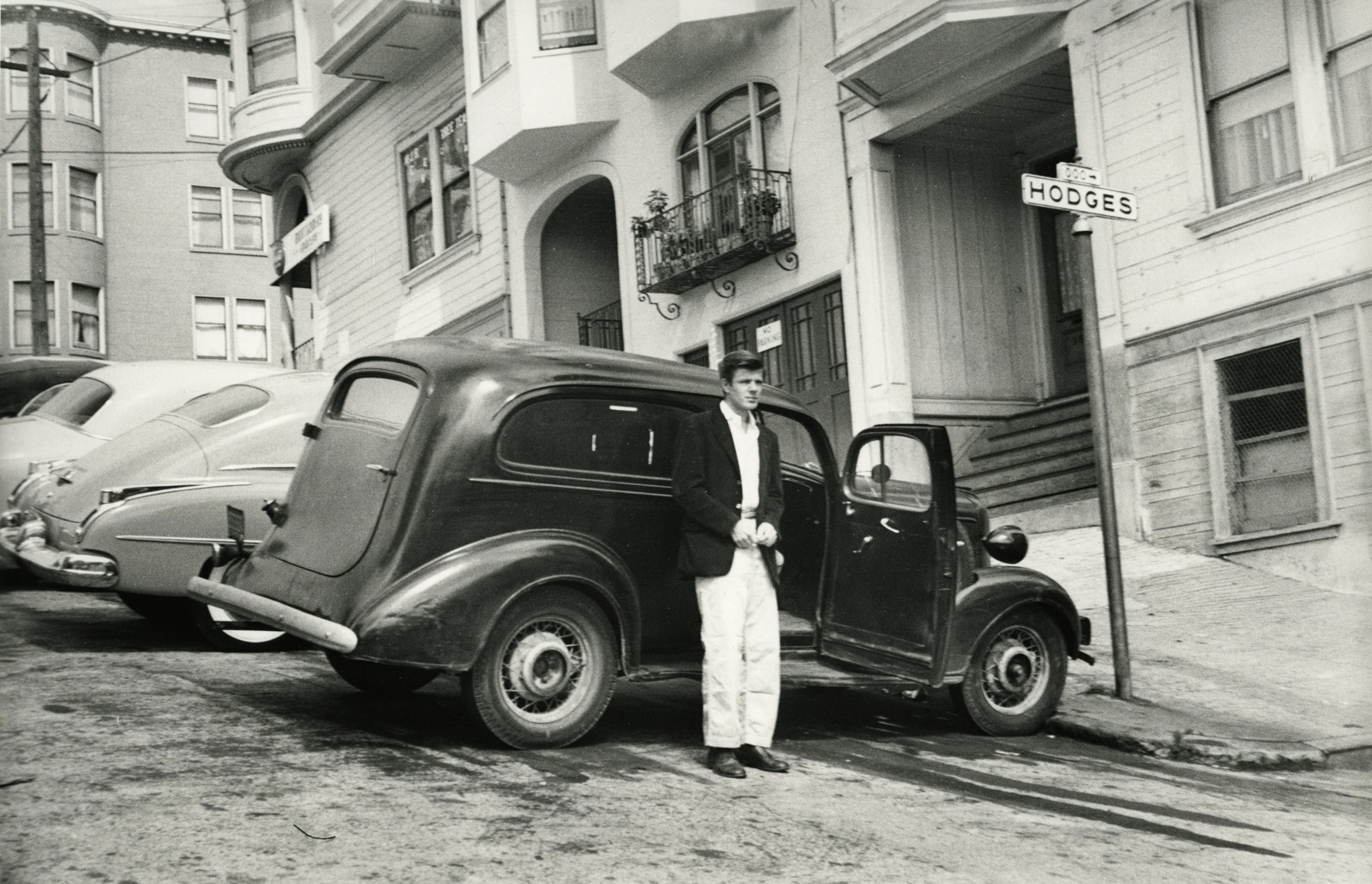 Allen Ginsberg - Peter Orlovsky age 21 with our first care "The Hearse", San Francisco, 1955 - Howard Greenberg Gallery