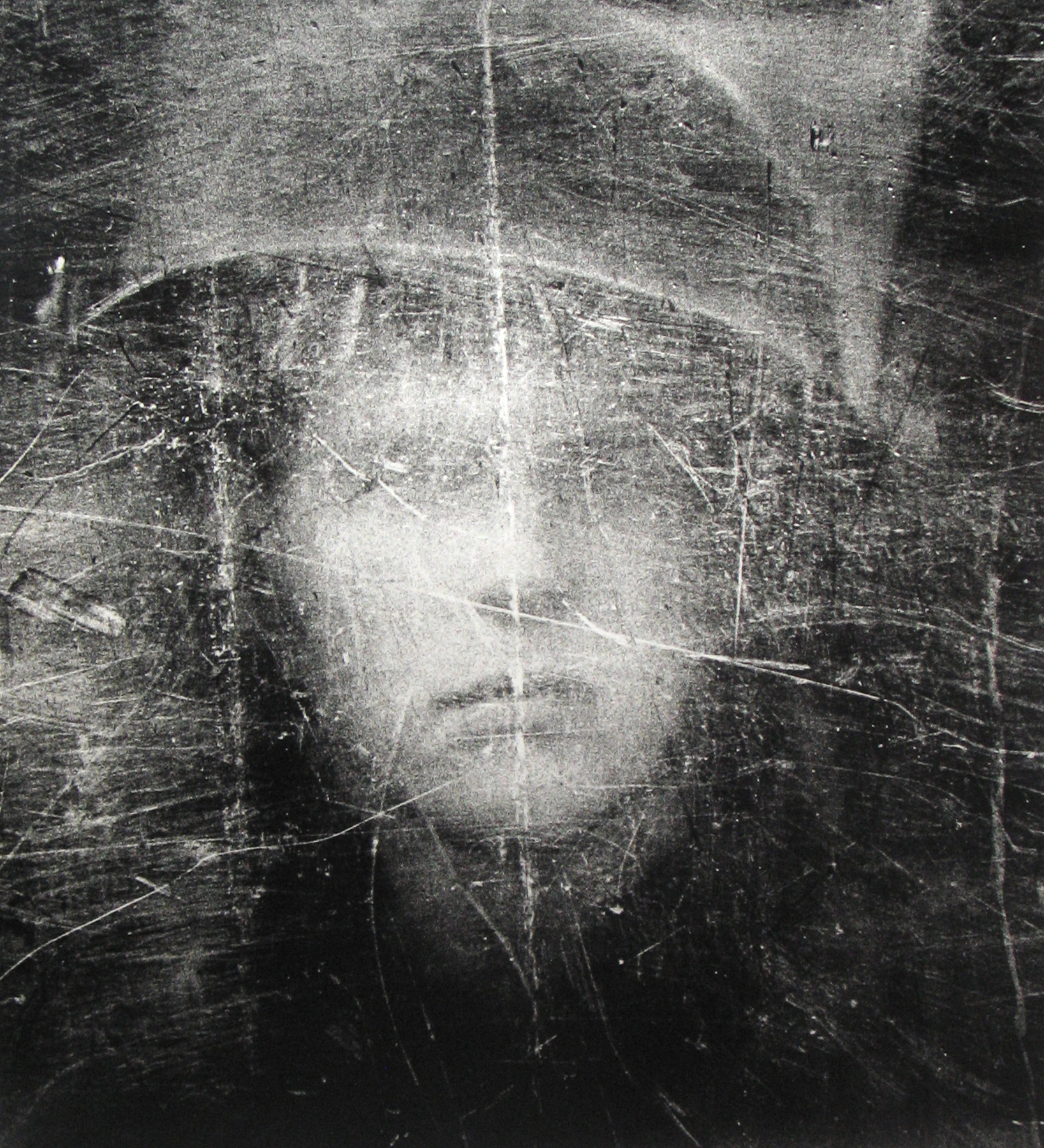 Philip Jones Griffiths - Soldier seen through shield, Northern Ireland, 1973 - Howard Greenberg Gallery