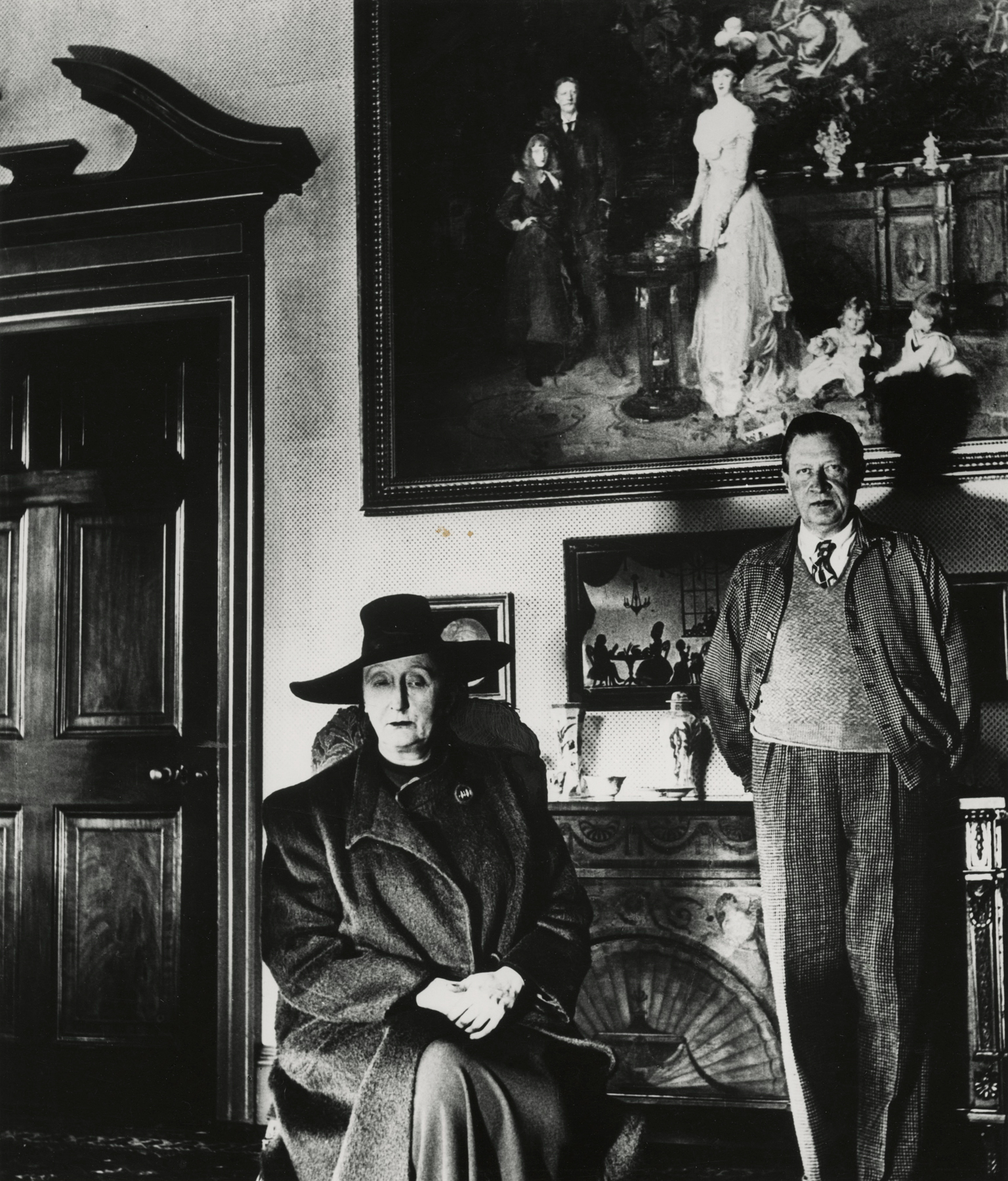 Bill Brandt - Edith and Osbert Sitwell beneath the Family Group by Sargent, Renishaw Hall, Yorkshire, 1945 - Howard Greenberg Gallery