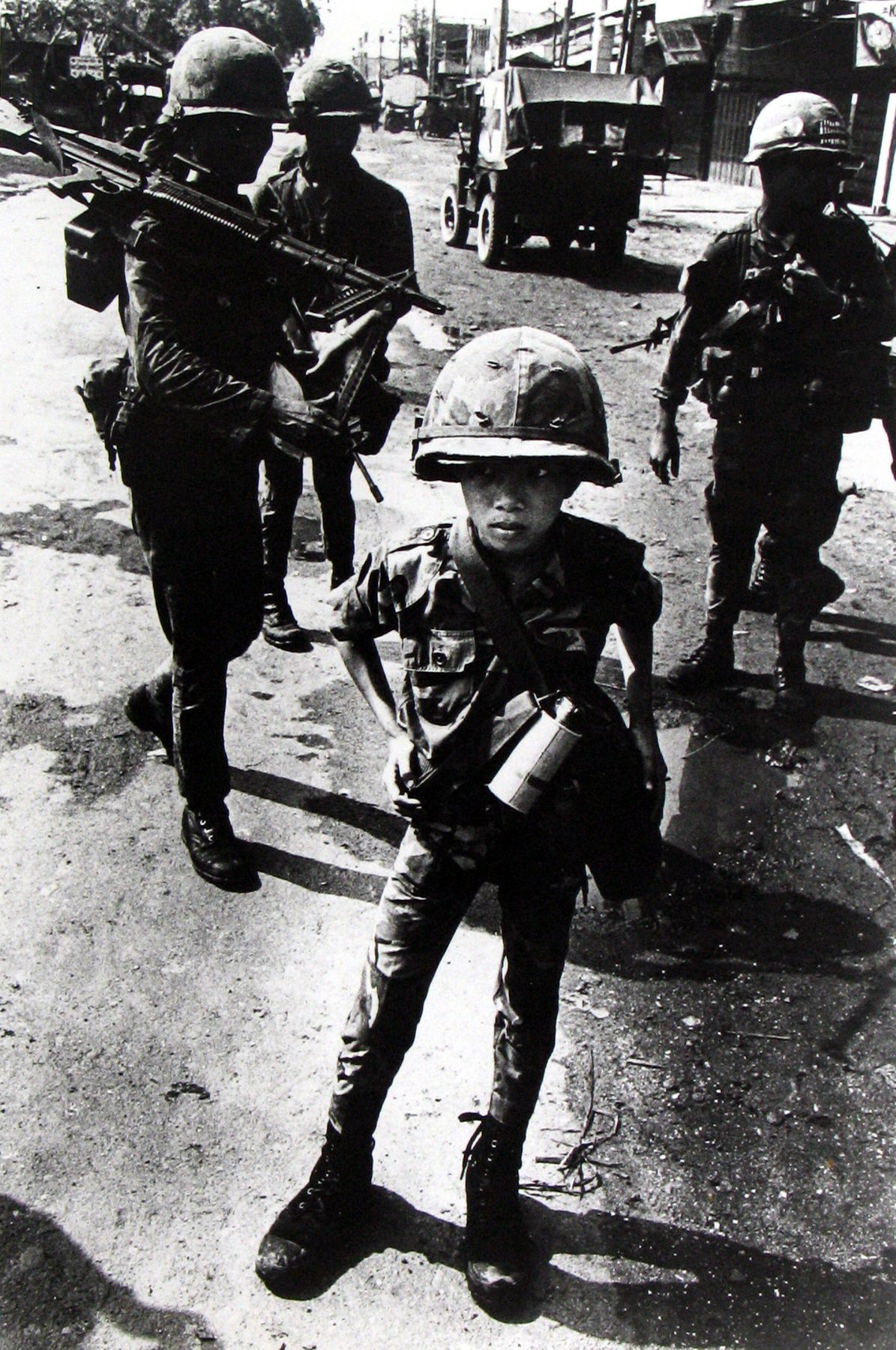 Philip Jones Griffiths - Called "Little Tiger" for killing two "Vietcong women cadre" - his mother and teacher, it was rumored, 1968 - Howard Greenberg Gallery