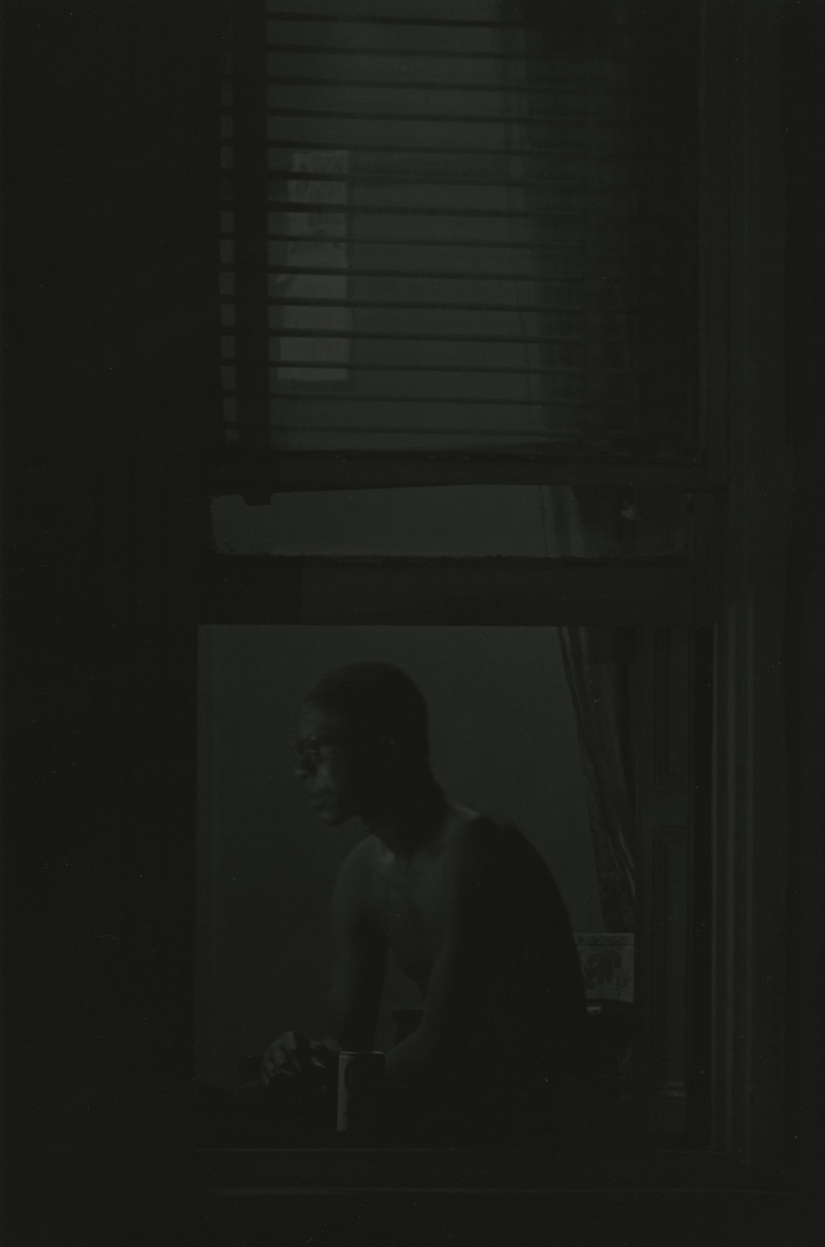 Roy DeCarava - Man in Window, New York, 1978 - Howard Greenberg Gallery