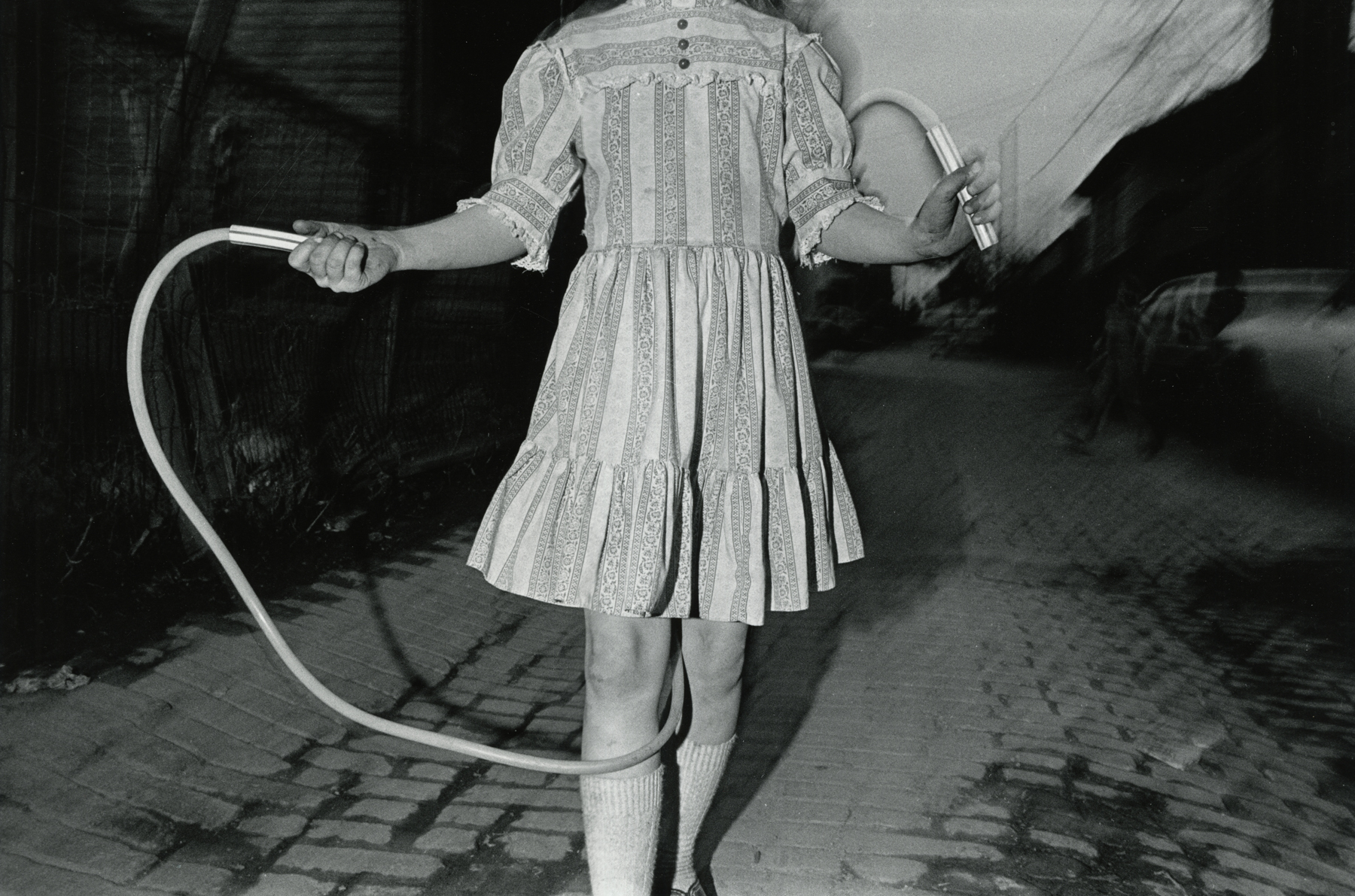 Mark Cohen, Jump Rope, 1975     Gelatin silver print; printed 2001 12 1/2 x 18 5/8 inches