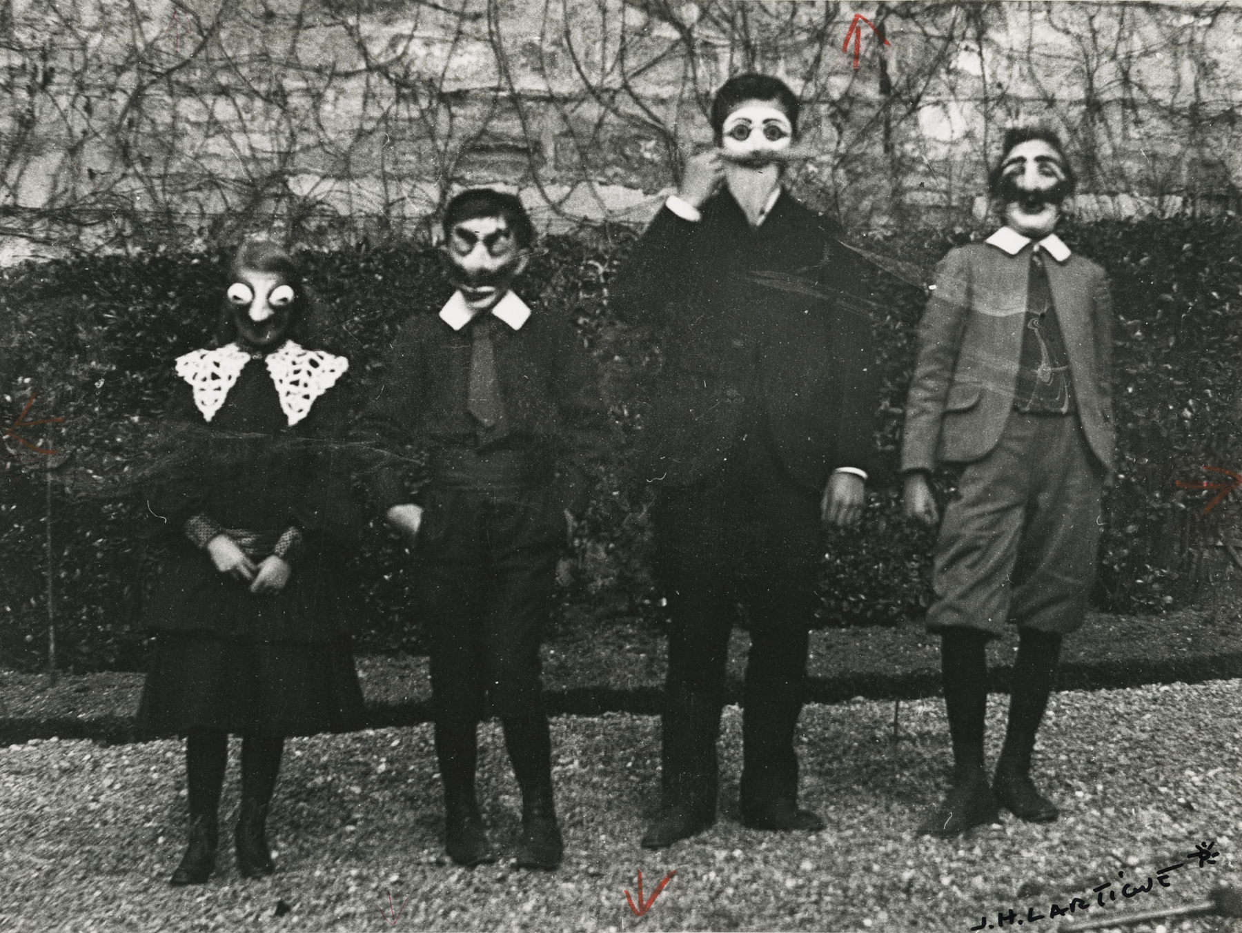 Jacques-Henri Lartigue - Mardi Gras with Bouboutte, Louis, Robert, and Zissou, Paris, 1903 - Howard Greenberg Gallery