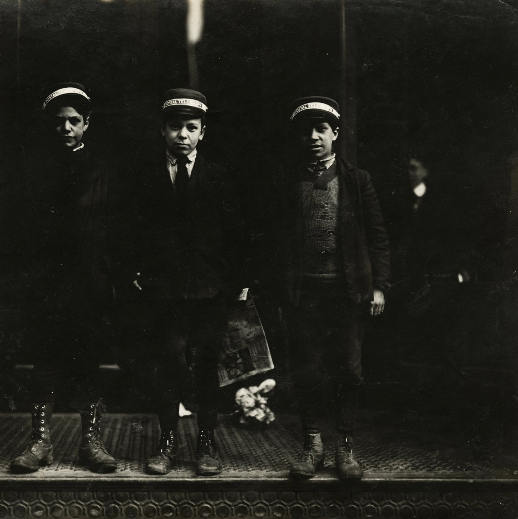 Lewis Hine - Messenger boys. They work until 11 p.m. New Haven, Connecticut  March, 1909 - Howard Greenberg Gallery