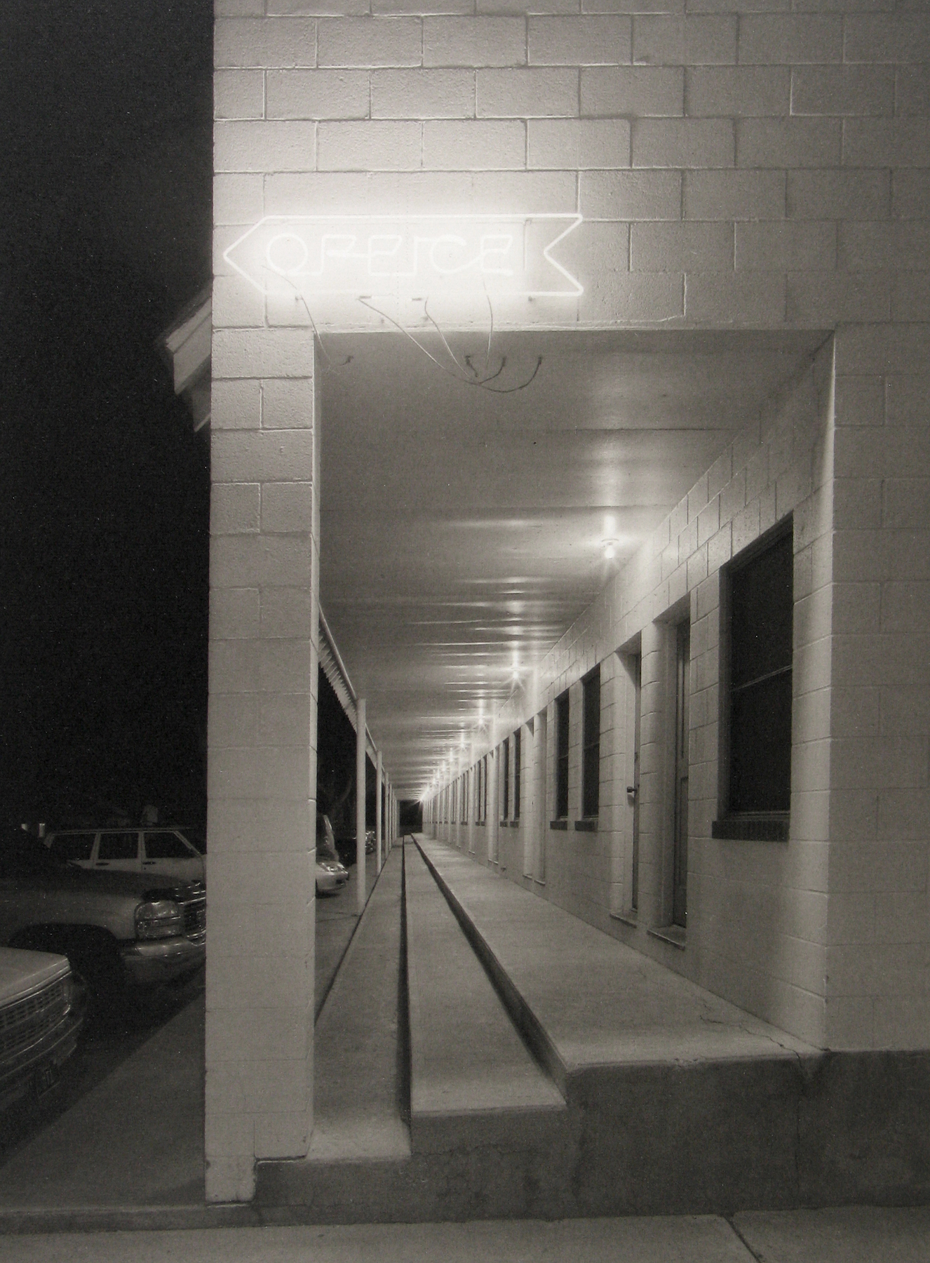 Mark Citret - Long Outdoor Corridor, Shady Court Motel, Winnemucca, 2009- Howard Greenberg Gallery