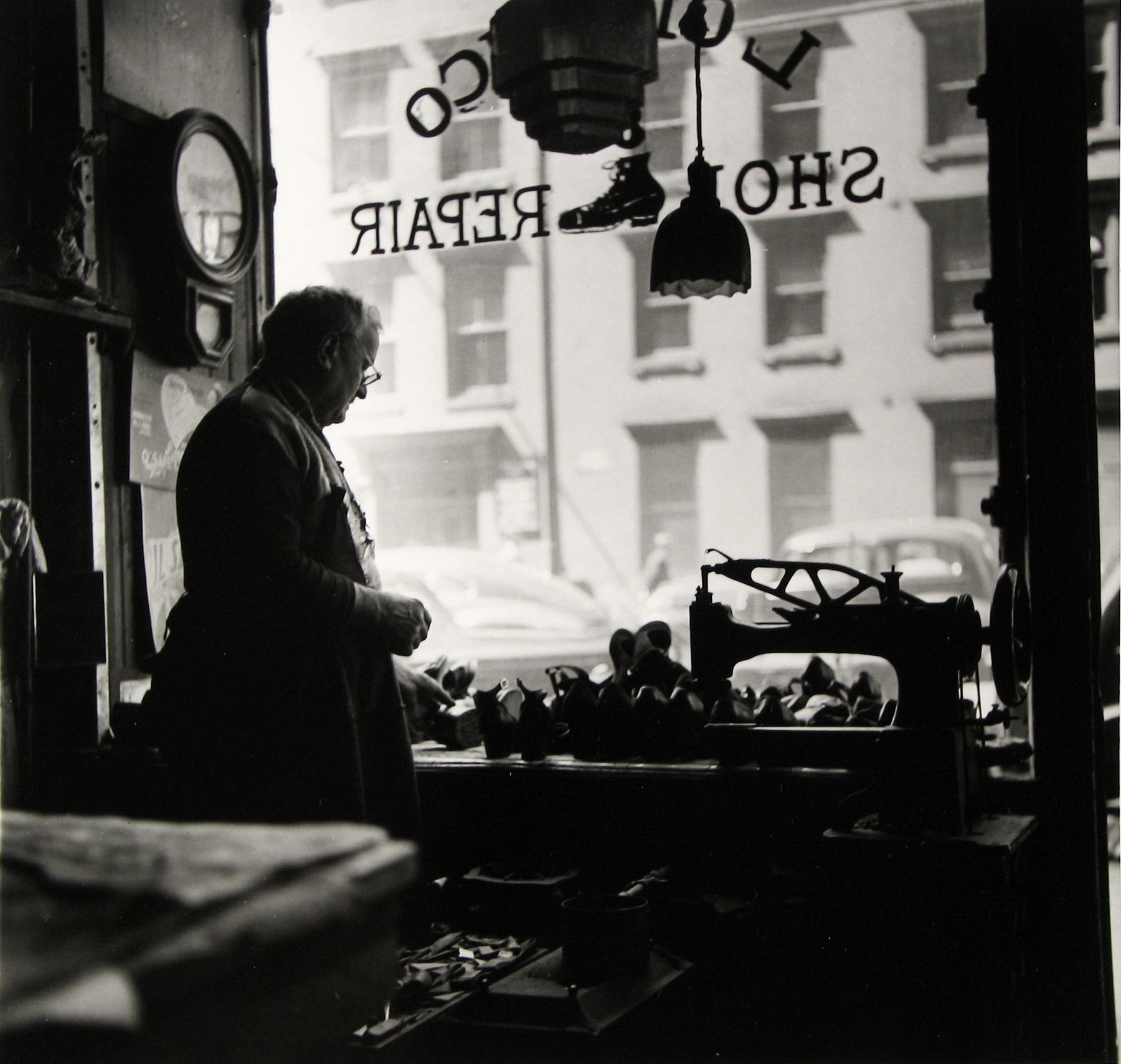 Rebecca Lepkoff - Shoemaker, Madison Street, Lower Manhattan, NYC, 1940s - Howard Greenberg Gallery