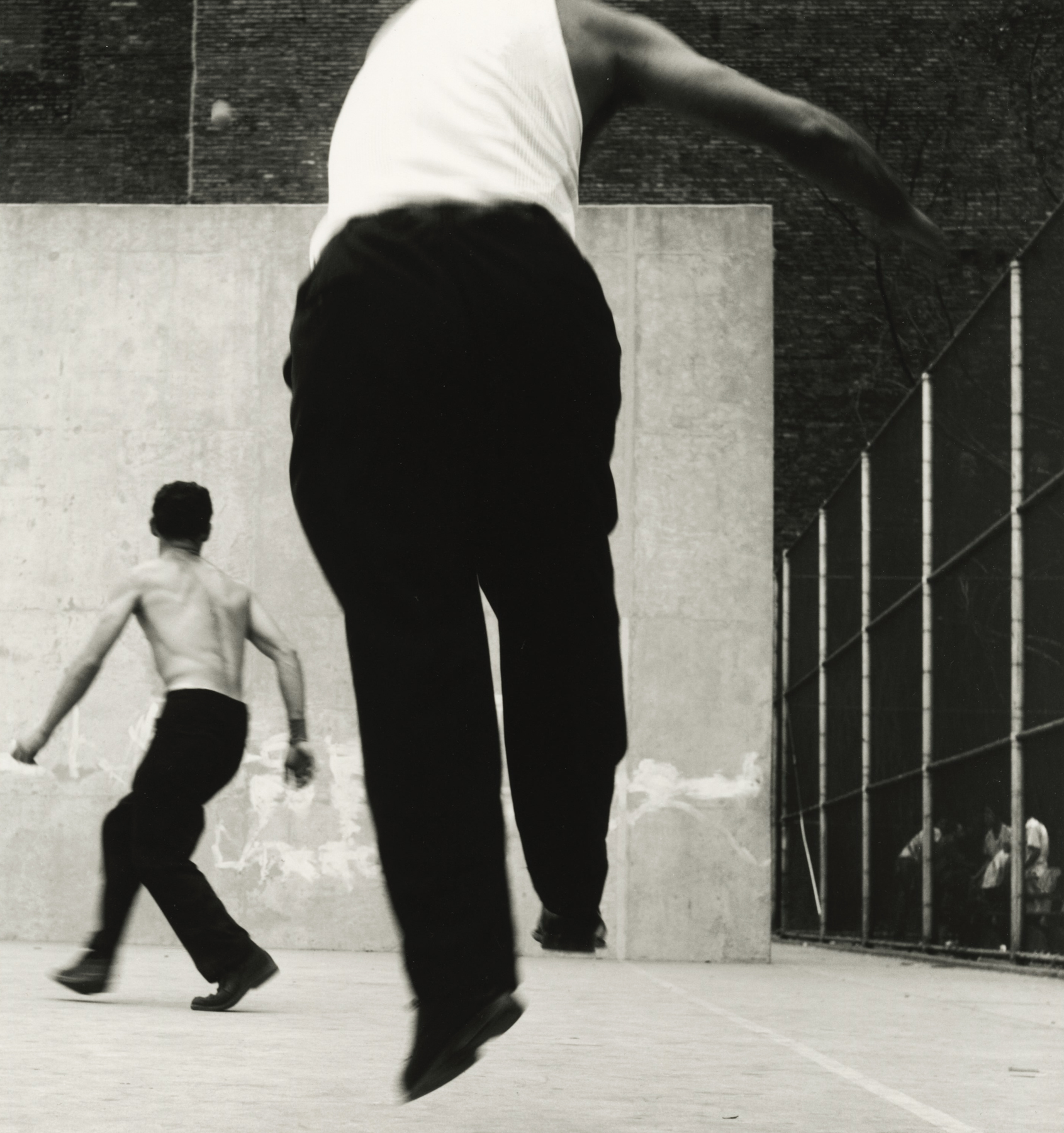 Leon Levinstein - Handball Players, Houston Street, New York, 1955 - Howard Greenberg Gallery