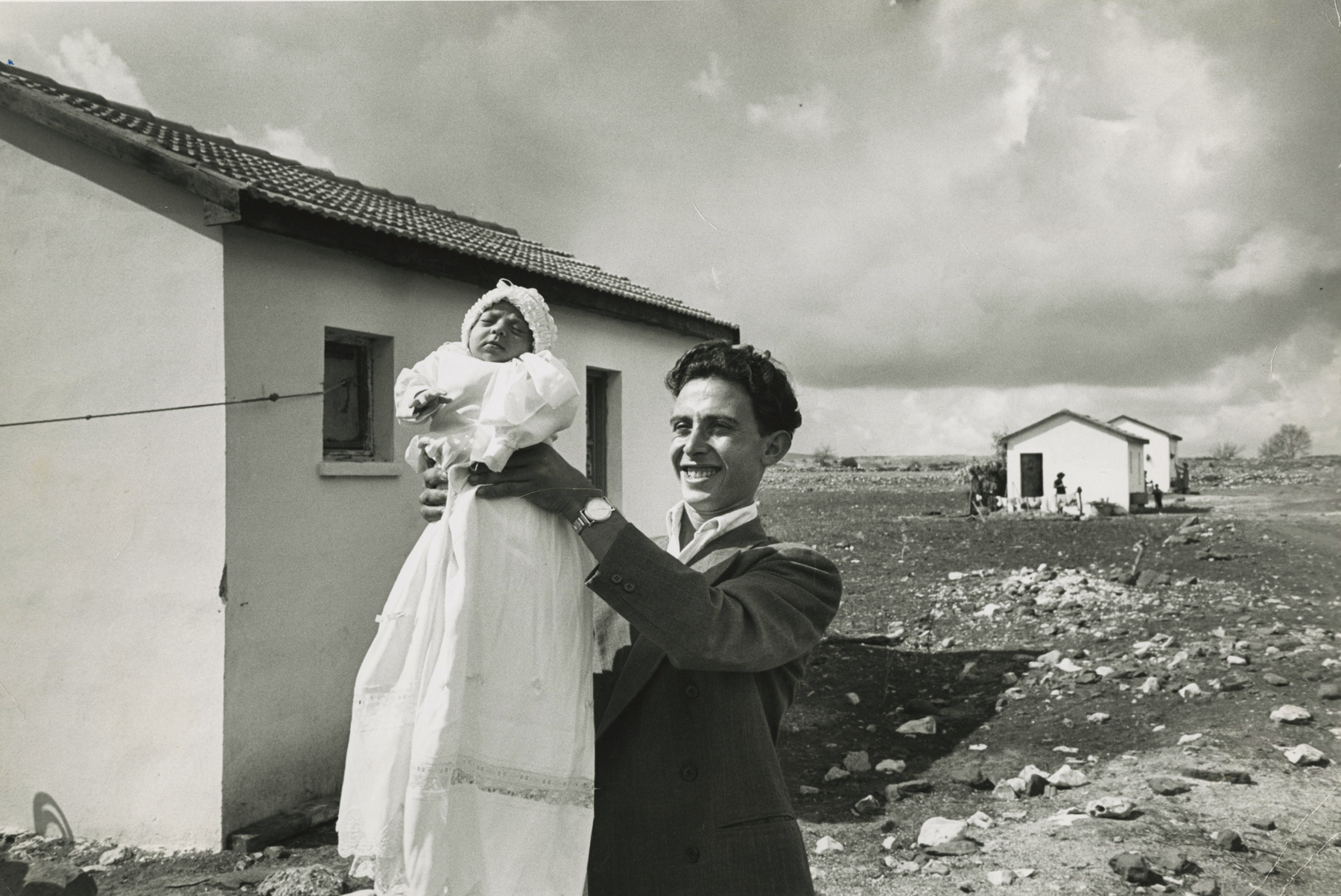 David Seymour "Chim" - First Child Born in Settlement, Alma, Israel, 1951 - Howard Greenberg Gallery
