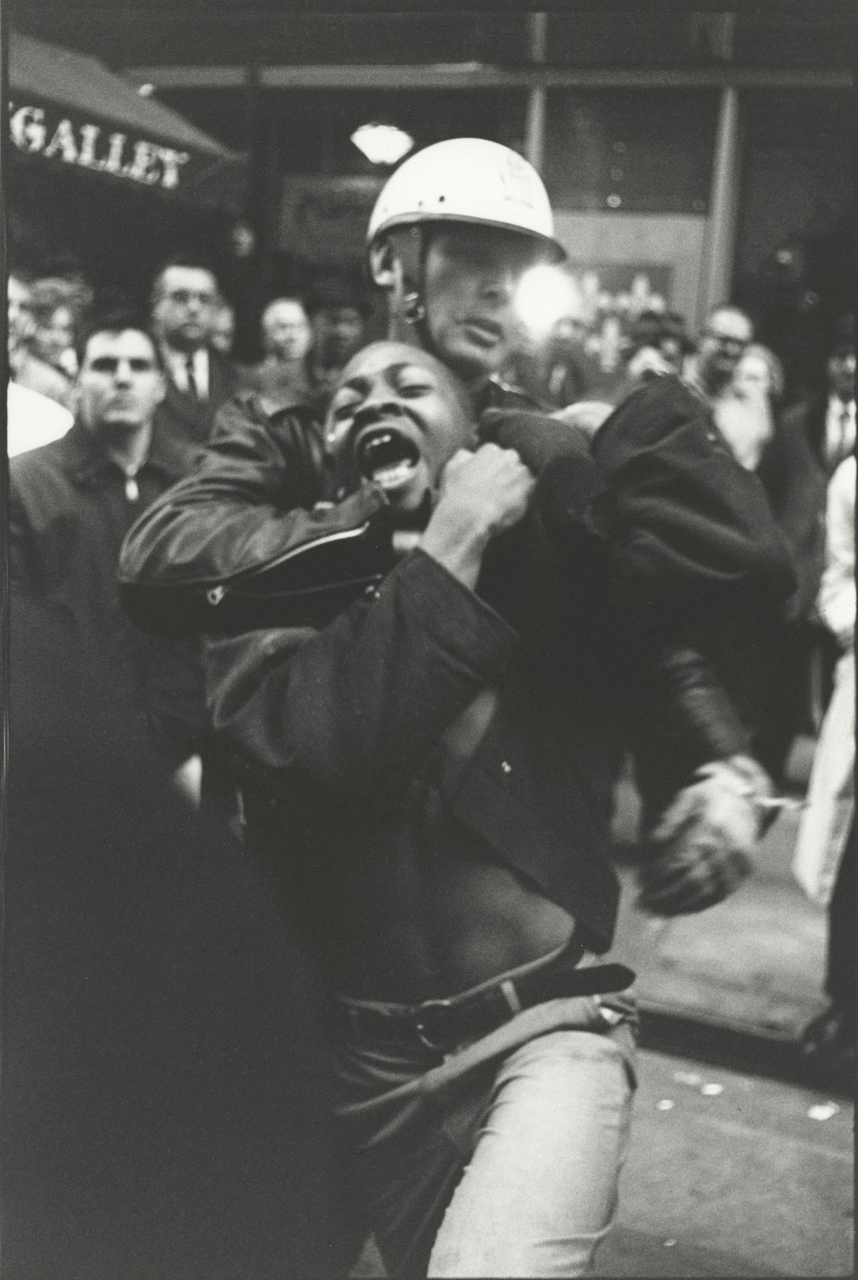 Danny Lyon, Atlanta, Georgia. High School Student Taylor Washington is Arrested at Lebs Delicatessen., 1963