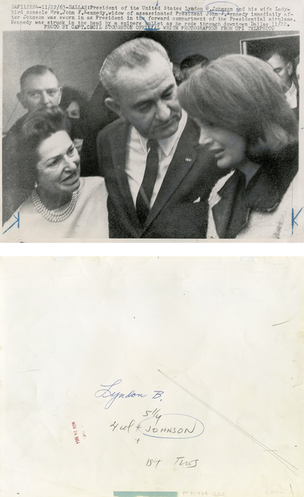 Cecil W. Stoughton, Lyndon Baines Johnson, with wife Lady Bird Johnson console Jacqueline Kennedy after being sworn in as the 36th President of the United States on board Air Force One, November 22, 1963