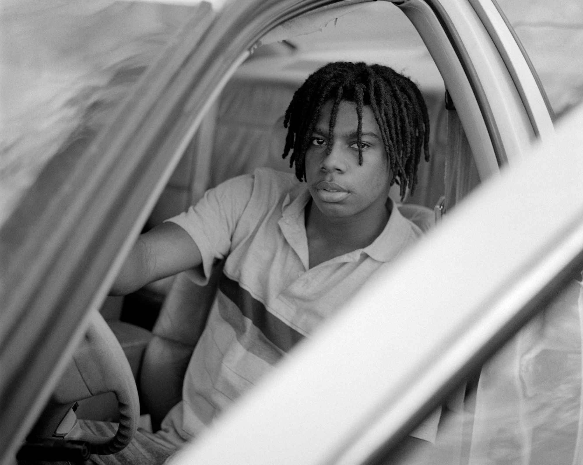 Young man in his car, Seguin, Texas, from the series, ”I Can't Stand to See You Cry”, 2021