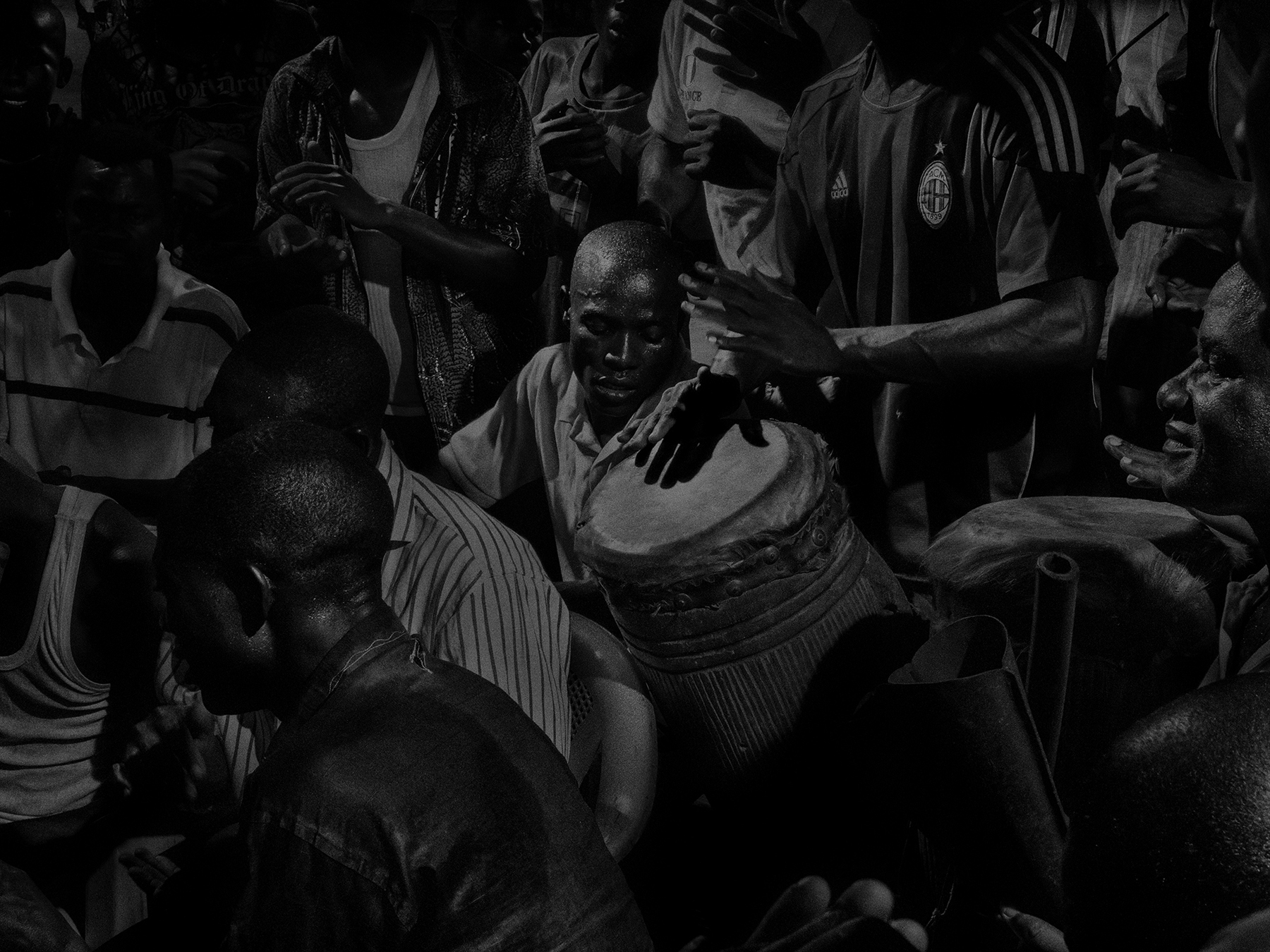 Alex Majoli Scene #9857, Republic of Congo, 2013  Archival pigment print; printed 2018  35 3/8 x 47 1/8 in.