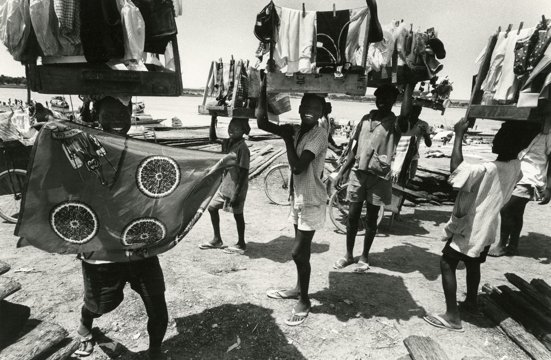 Untitled (Figures with textiles), 1963 Gelatin silver print; printed c.1980 9 3/8 x 14 inches