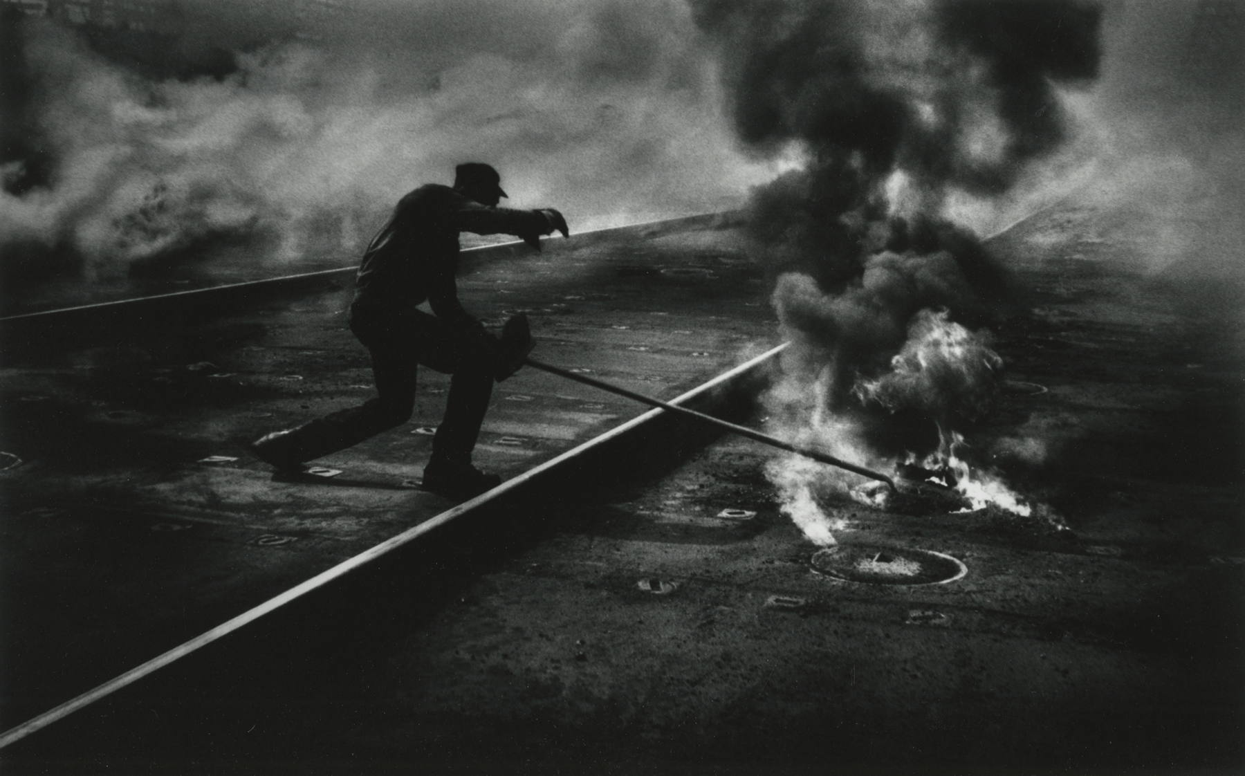 W. Eugene Smith  Dance of the Flaming Coke, from the Pittsburgh series, 1955 Gelatin silver print; printed c.1970 16 x 20 inches