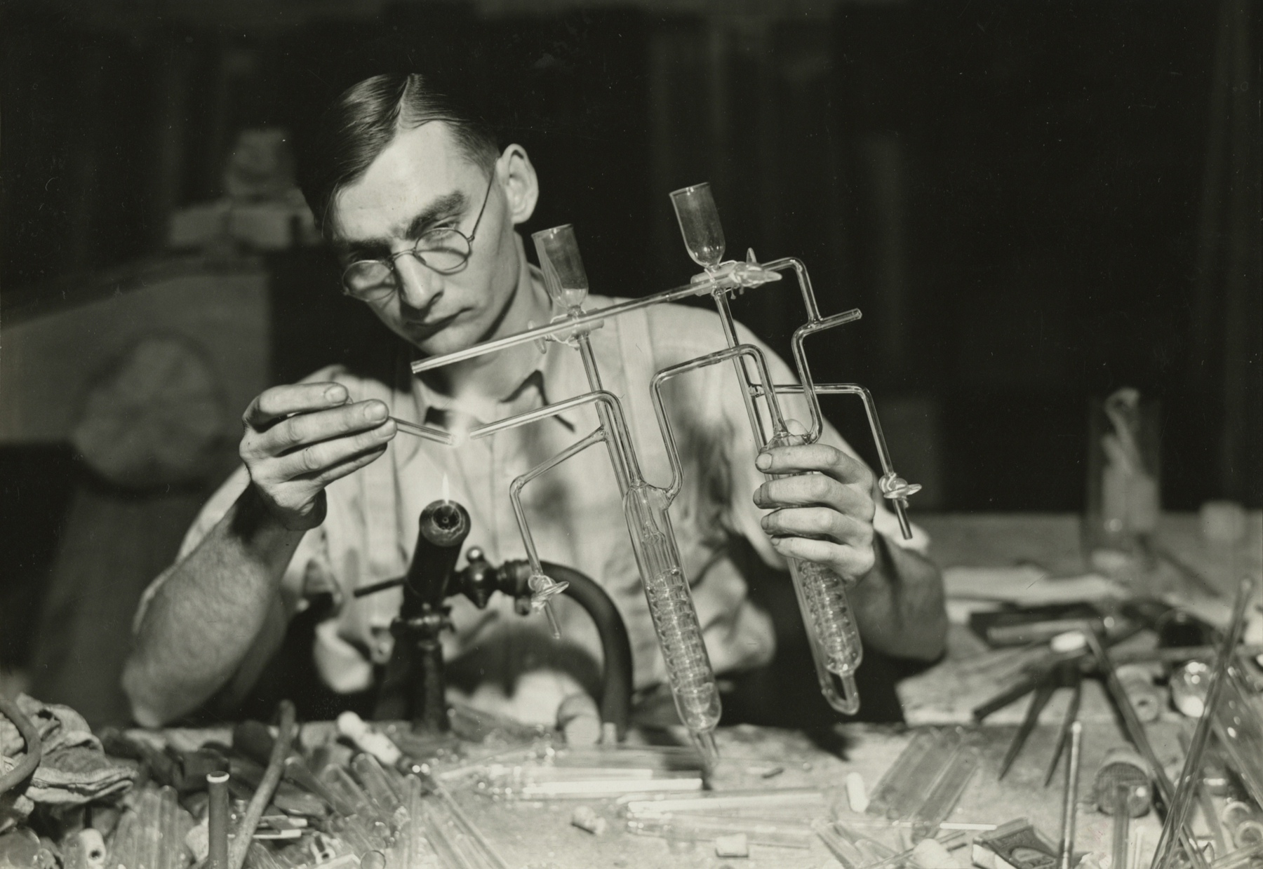Lewis Hine, Worker finishing the end of a sulphur determinator. L.G. Nestor Co., Millville, NJ, March 26, 1937