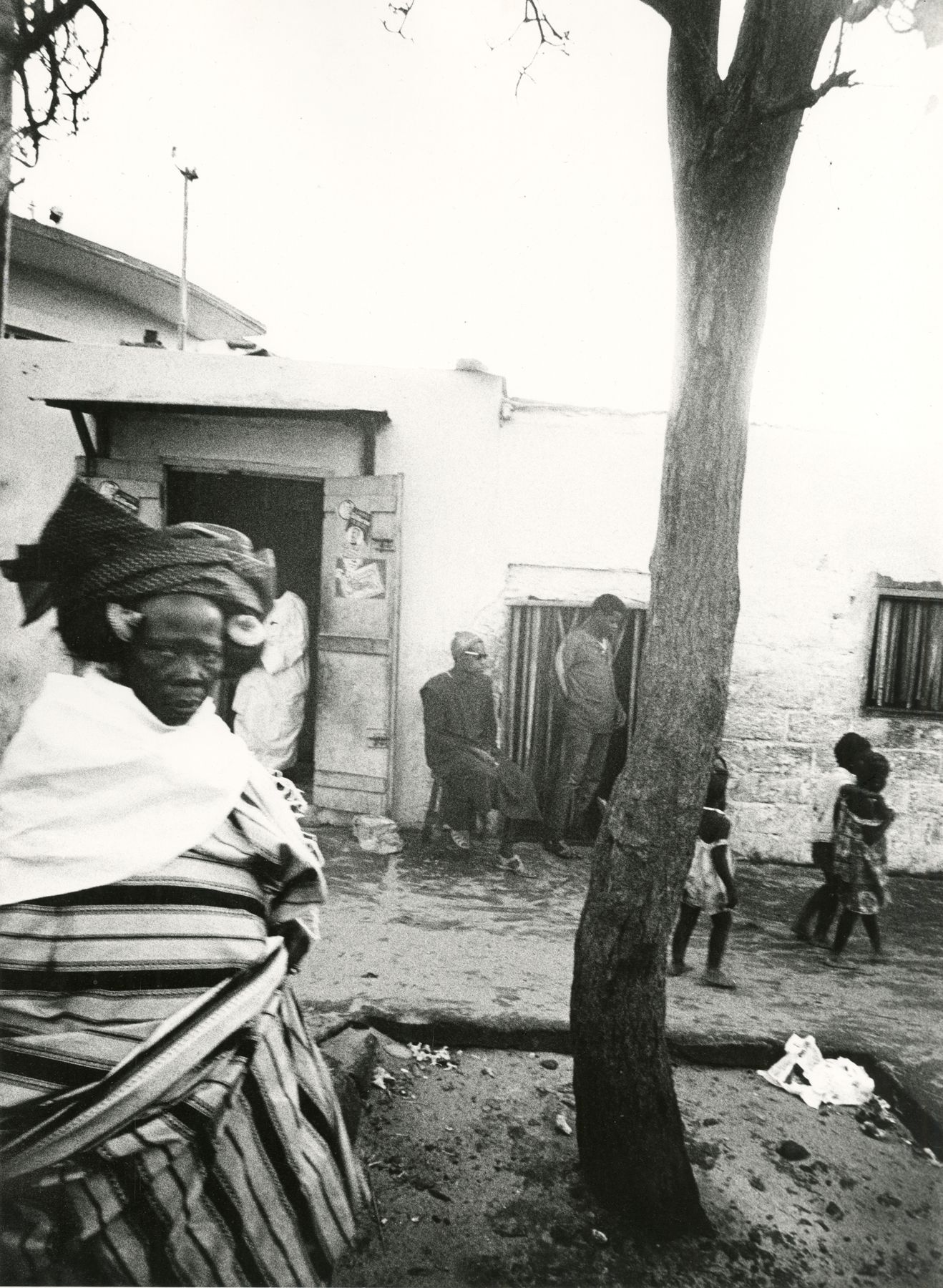 African Woman + Tree, 1963 Gelatin silver print; printed 1980 15 x 11 1/8 inches