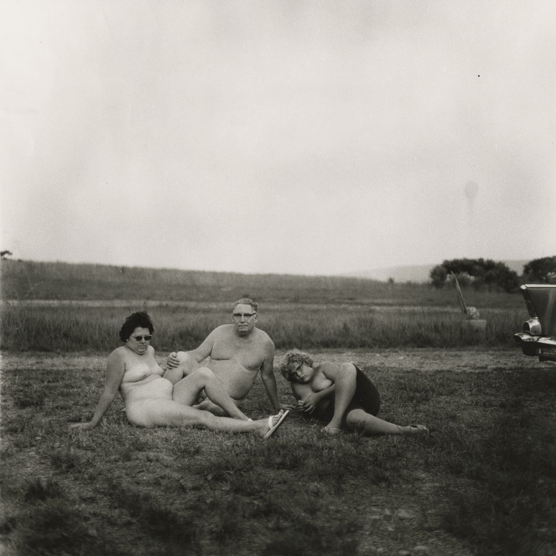 Diane Arbus
Family with Car, Nudist Camp, Pennsylvania, 1965
Gelatin silver print; printed c.1967-69
15 1/2 x 15 1/2 inches