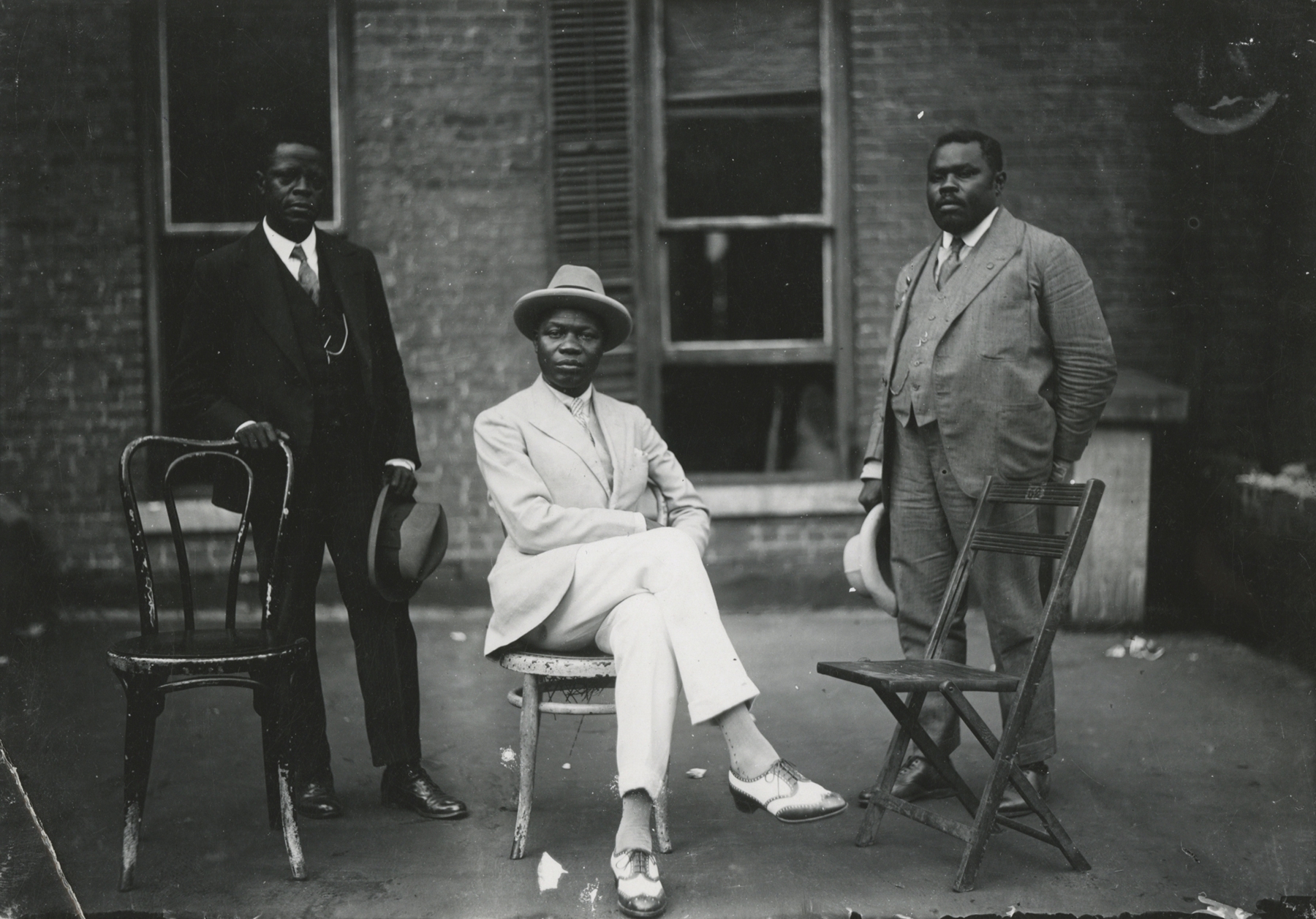 James Van Der Zee - Marcus Garvey with George O. Marke and Prince Kojo Tovalou-Houénou, 1924 - Howard Greenberg Gallery - 2019