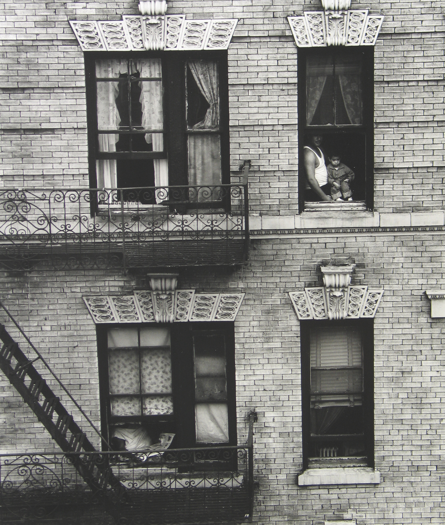 Bruce Davidson: East 100th Street, from the 2nd Edition 2009 Howard Greenberg Gallery