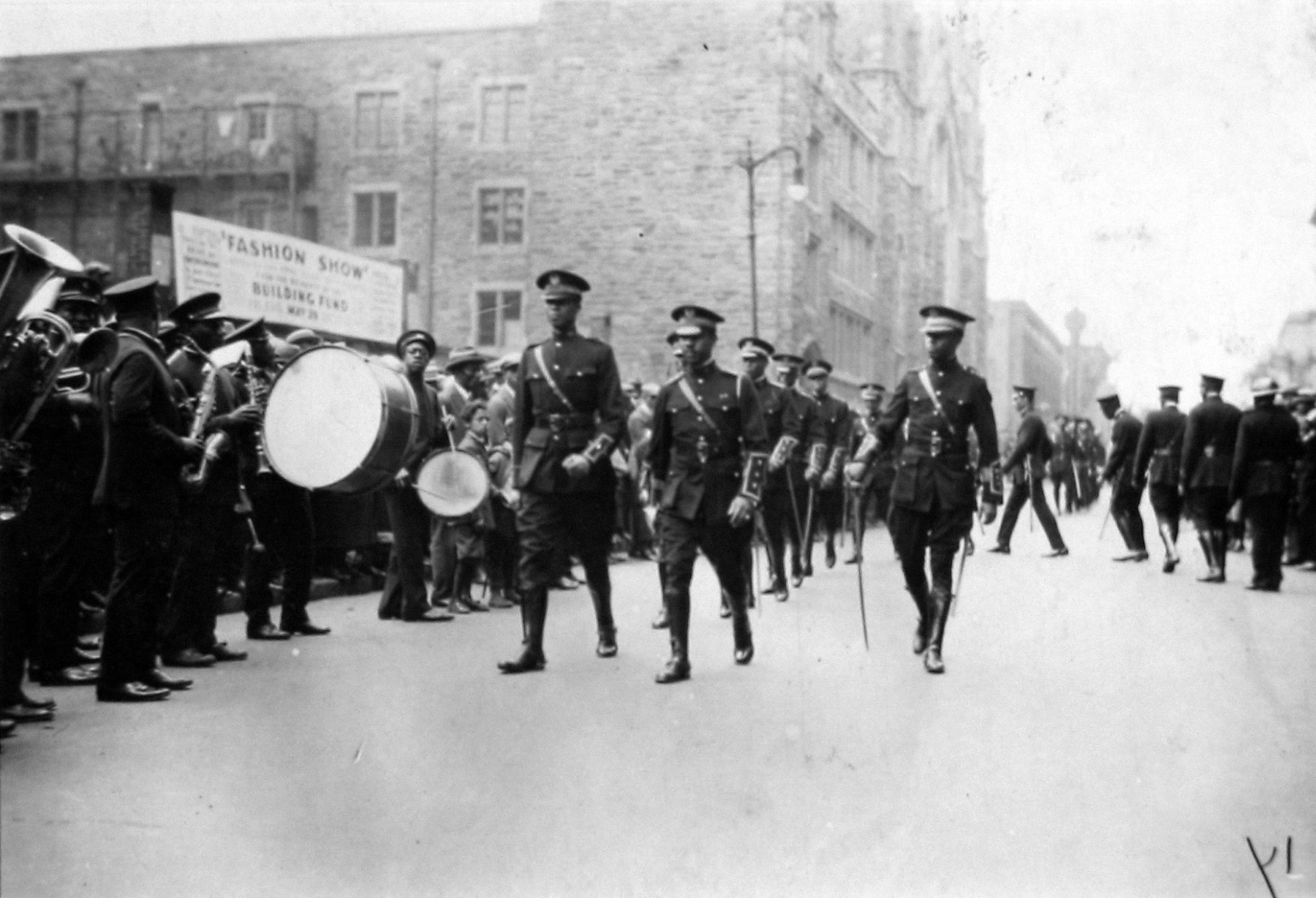 James Van Der Zee - Marcus Garvey Parade (soldiers marching in the street as band plays on), 1924 - Howard Greenberg Gallery - 2019