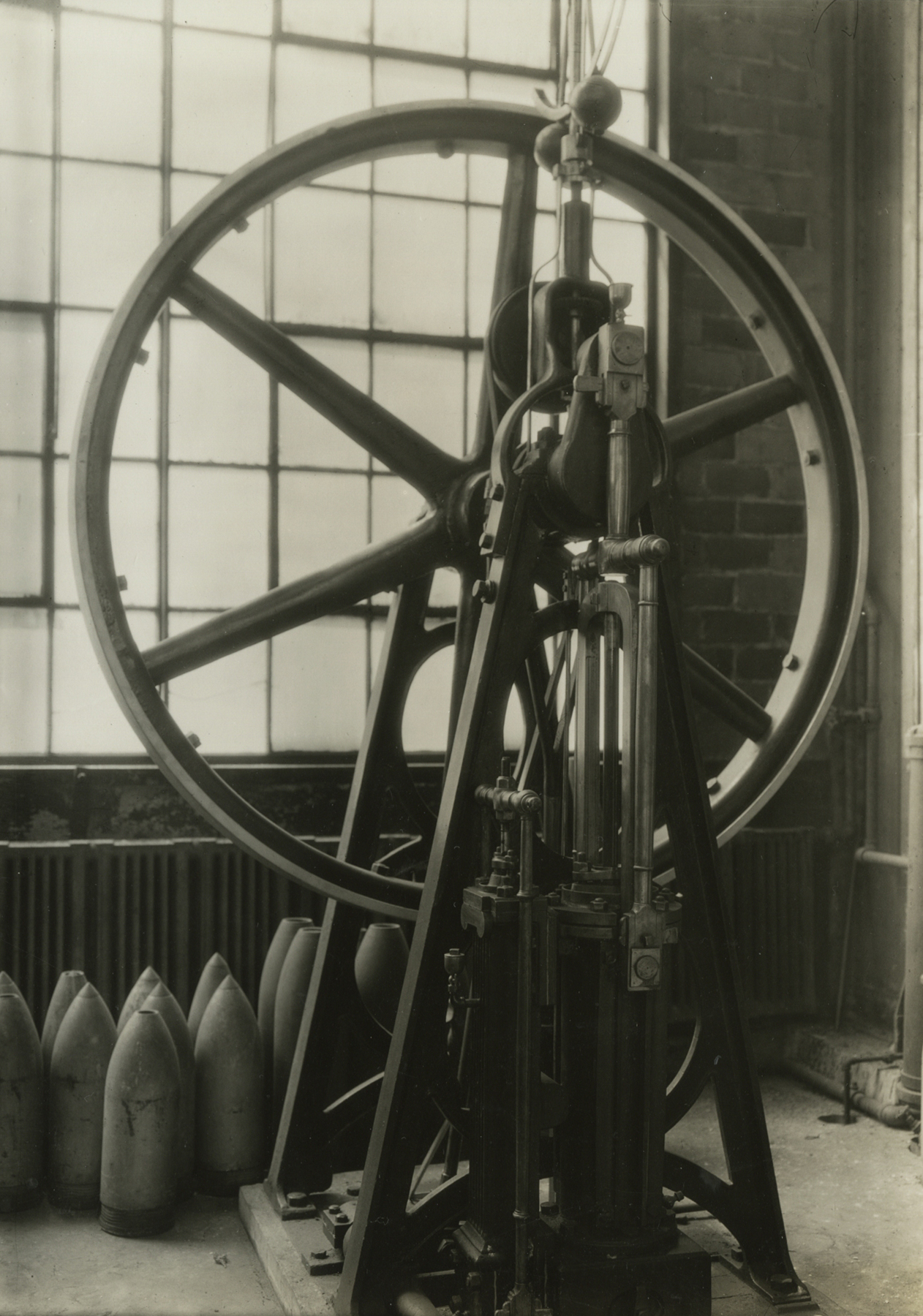 Lewis Hine, Stationary steam engine built by M.W. Baldwin before 1830, Baldwin Locomotive Works, Eddystone, Pennsylvania, May 1937   Gelatin silver print; printed c.1937   6 5/8 x 4 5/8 inches
