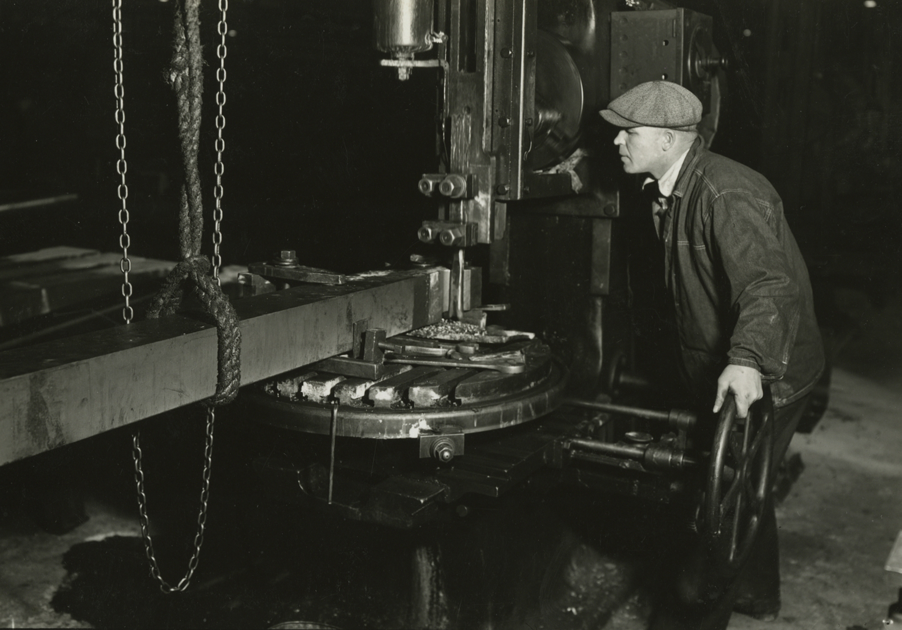 lewis hine, Machinist shaping a section of a driving-rod for largest locomotive, Baldwin Locomotive Works, Eddystone, Pennsylvania, March 1937   Gelatin silver print; printed c.1937   4 5/8 x 6 5/8 inches
