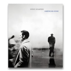 In June, 1963, on assignment from&nbsp;Sports Illustrated, peerless portrait photographer Steve Schapiro traveled to Louisville, Kentucky to spend some time with the young Olympic champion boxer Cassius Clay and accompany him on a road trip to New York City. At 21, Clay was yet to adopt the mantel of Muhammad Ali, but his boastful persona, intelligence, black pride, and sharp tongue were already fully formed.

Of the course of their five days together, Schapiro&ndash;a master at developing trust and capturing unguarded intimacy on film&mdash;revealed both sides of the young Ali: the one side posing and preening for the camera, ever conscious of his image; the other, unguarded and unselfconscious, in candid images of the young fighter at home with his family and immersed in his community and neighborhood.

Ali&nbsp;collects the best of Schapiro&rsquo;s images of the late fighter; many in print for the first time ever. They offer a glimpse of a star on the rise. It is an indelible portrait of the early life of one of the most talented, graceful, controversial, athletic, and influential American figures of the 20th century.

&nbsp;

&nbsp;